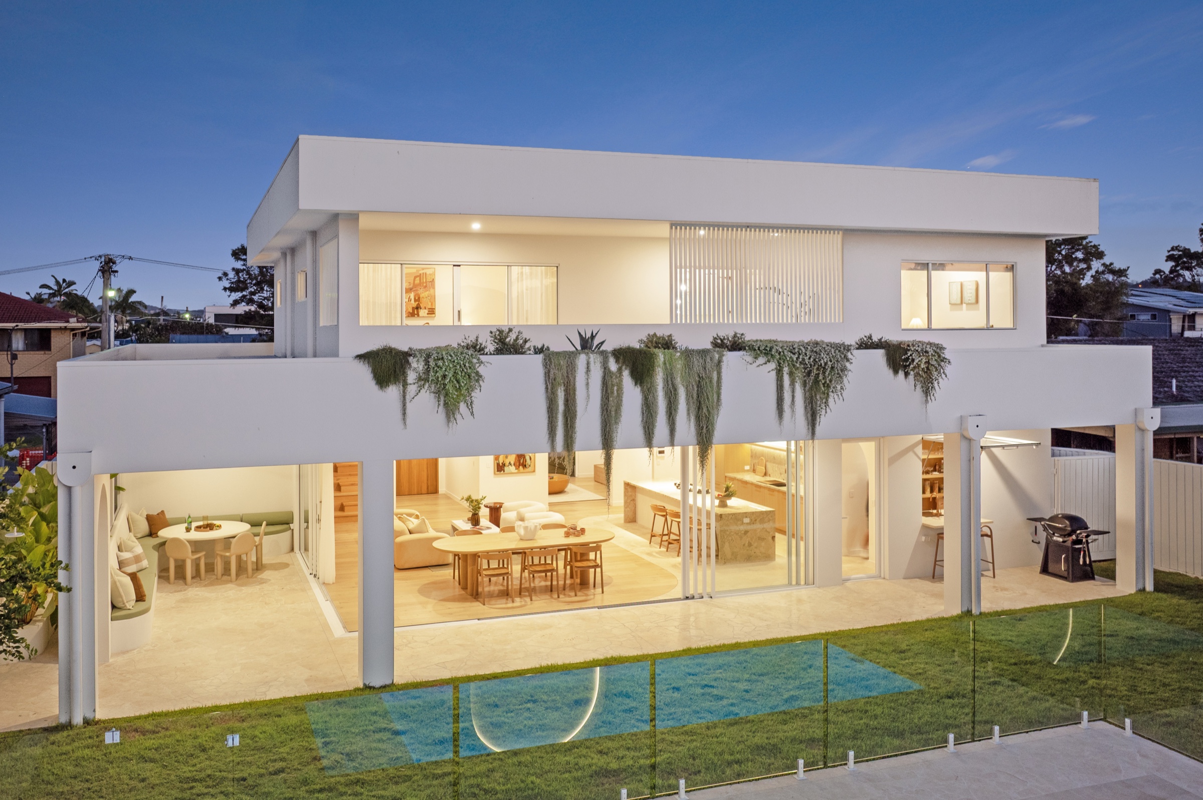 5 Iluka Street, Palm Beach at dusk, rear pavilion with glowing interiors